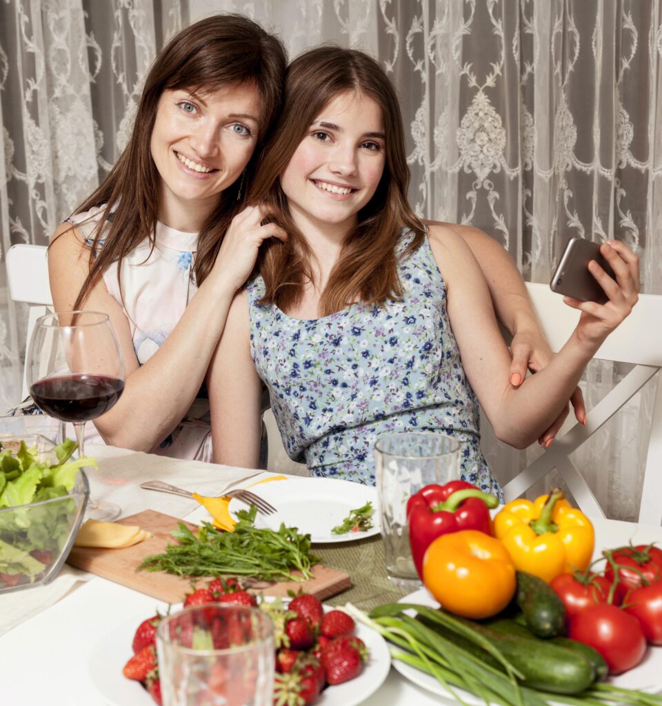 mother-daughter-posing-dinner-table