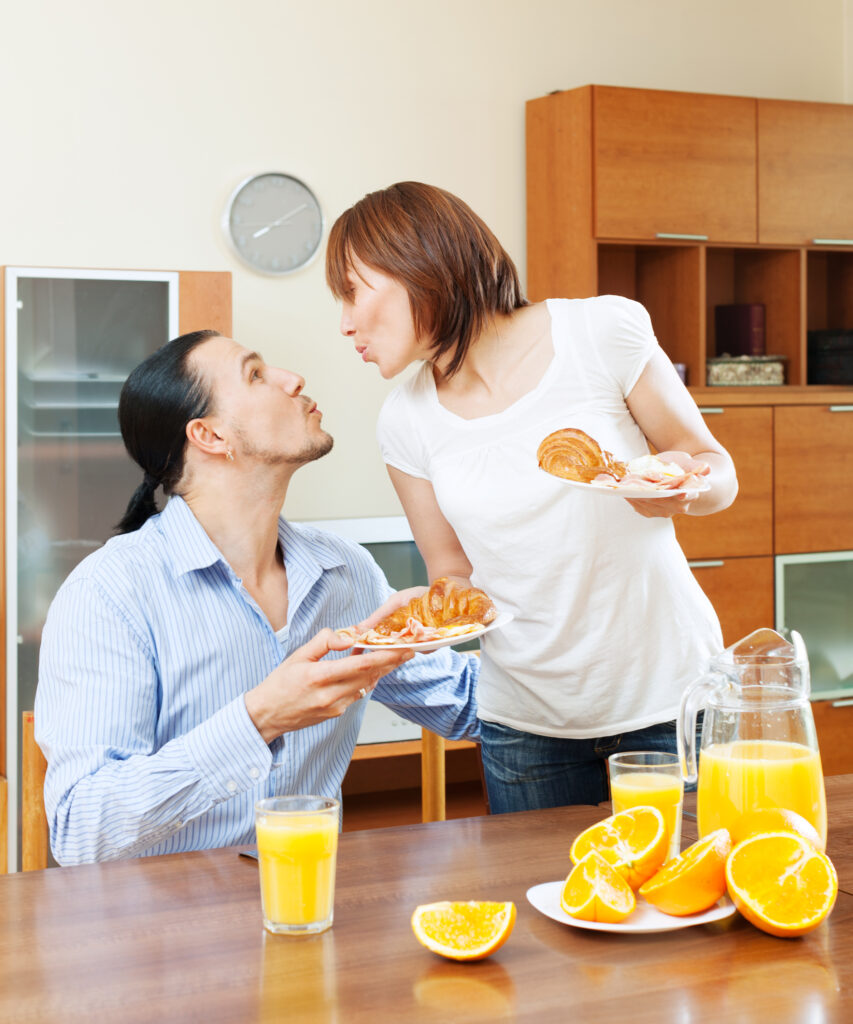 woman-serves-breakfast-her-beloved-man